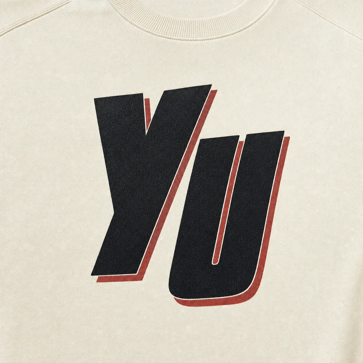 Screen printed lettering on a sweatshirt as a visual process reference